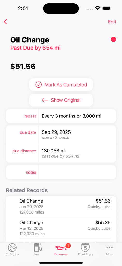 A maintenance screen in the Road Trip MPG app showing an overdue oil change reminder and previous service records.