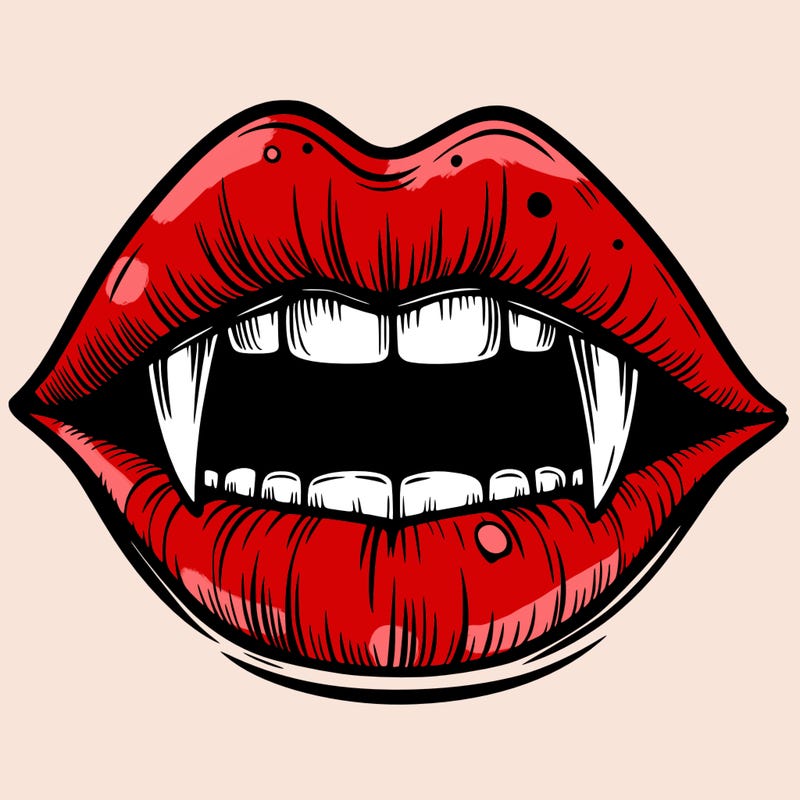 lips with vampire teeth