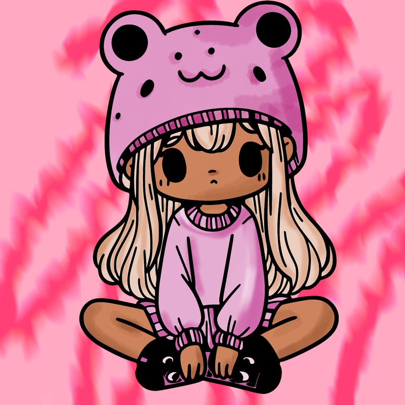 a girl wearing a frog hat and some frog socks