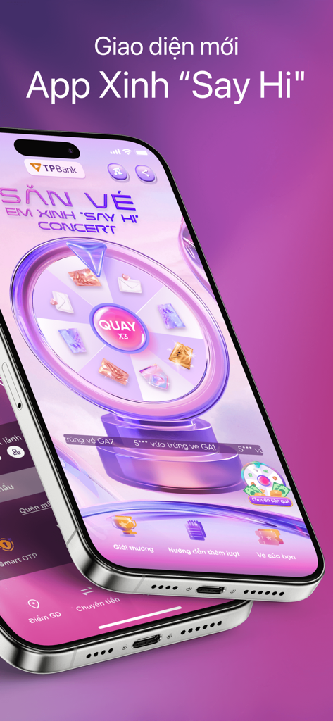 TPBank Mobile - A screenshot of the TPBank Mobile app featuring a purple gamified spinning wheel interface for a concert ticket promotion