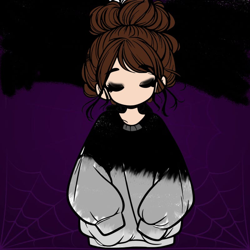 girl with baggy sweatshirt and messy bun