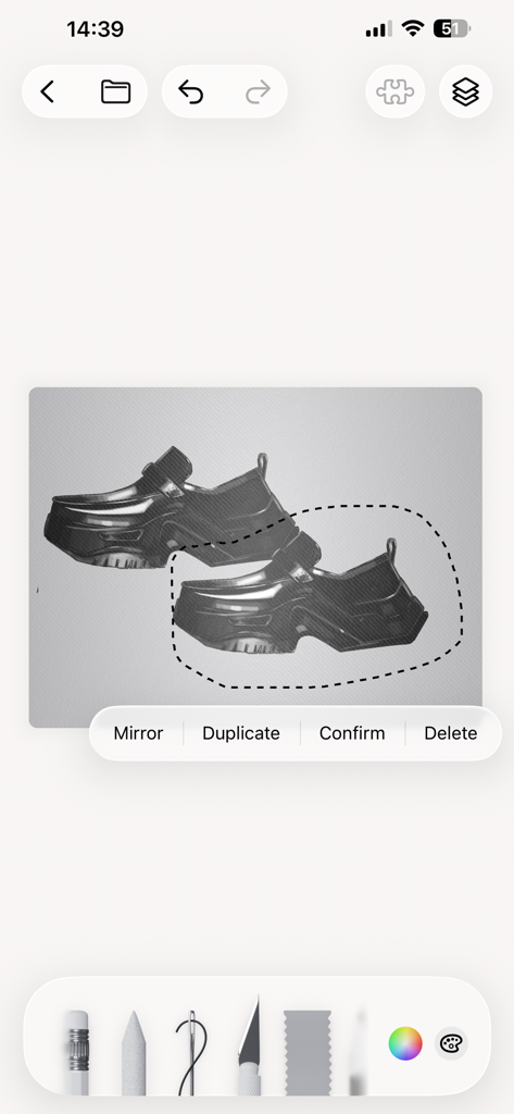 A sneaker sketch inside the Pret a Template app with editing tools for mirroring and duplicating