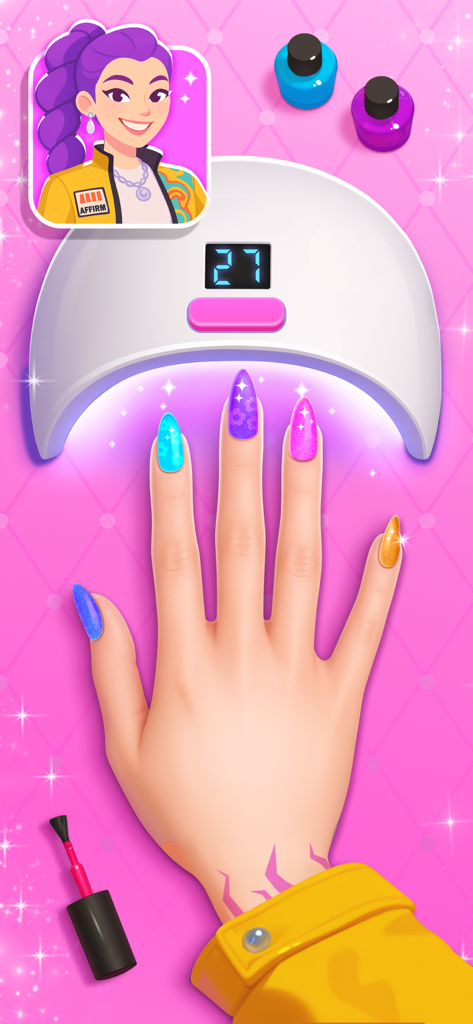 Nail Salon Games for Kids 2-5 - Une main avec des ongles peints de couleurs vives séchant sous une lampe UV dans un jeu de manucure pour enfants.