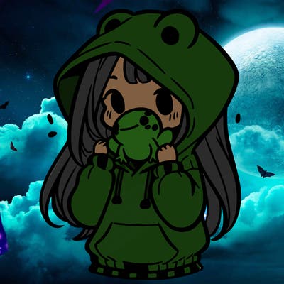 a girl holding a froggy hoodie