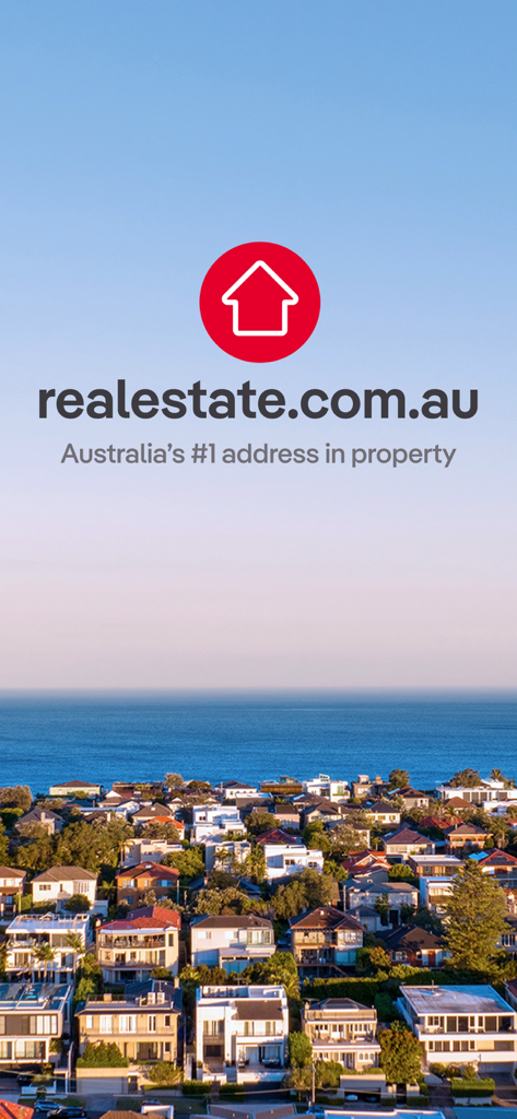 realestate.com.au - Property - Vista aérea de um subúrbio costeiro australiano com o logotipo e slogan do realestate.com.au