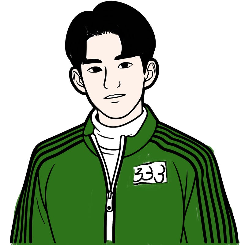 k-pop man in a track suit