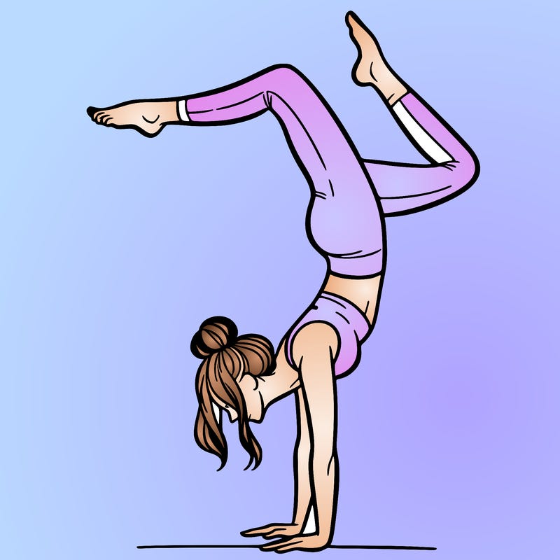 a woman doing a handstand