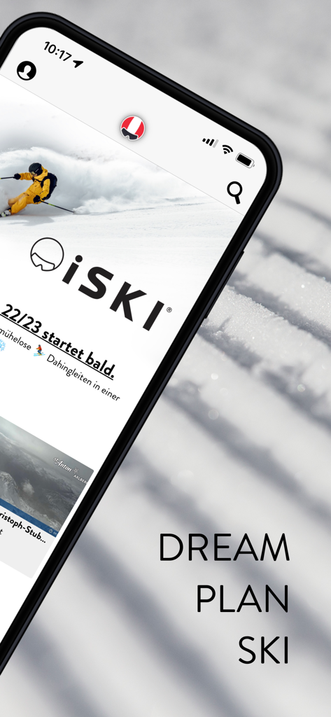 iSKI Austria - Ski & Snow - iSKI Austria App auf dem iPhone mit einem Skifahrer-Bild und dem Text Traum planen Ski