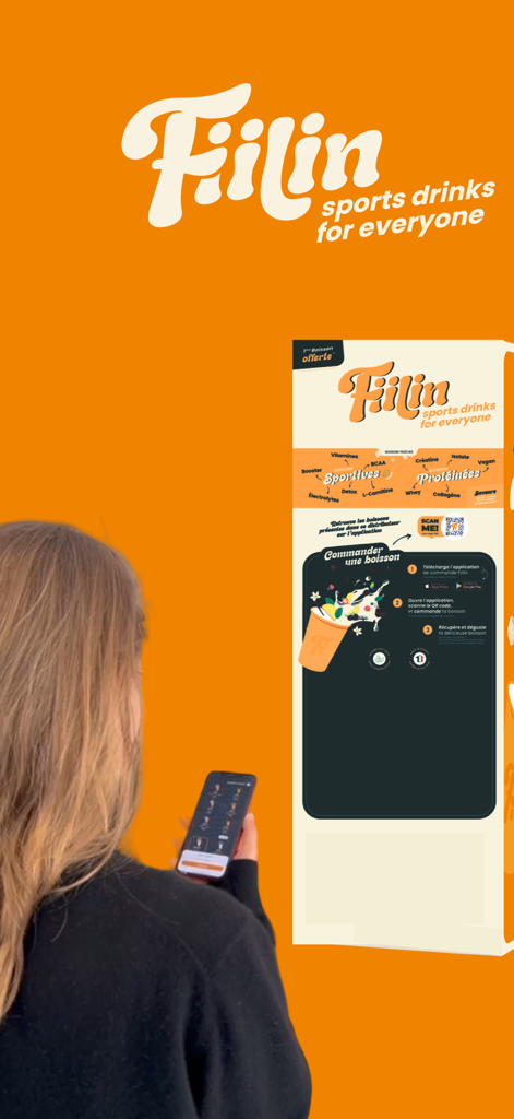 Fiilin - A woman using her smartphone to order a protein drink from a Fiilin dispenser.