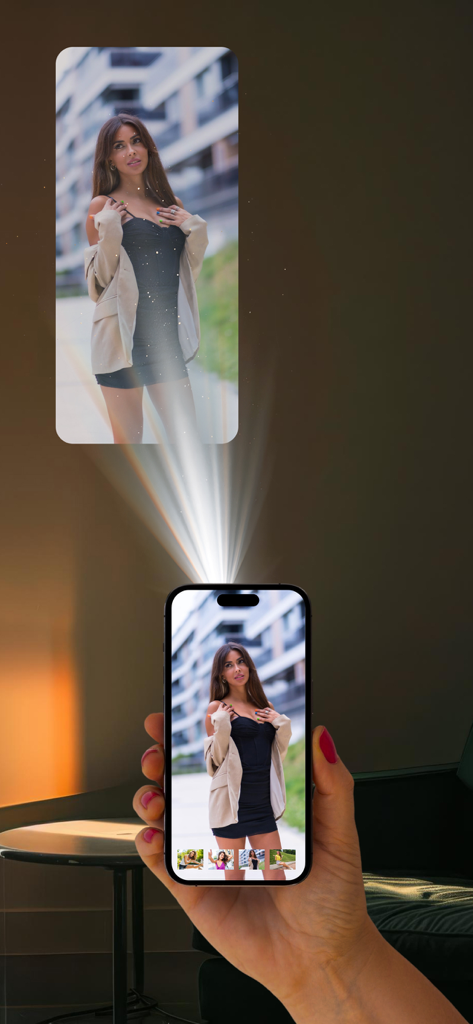 Mobile Projector Media - A person holding a smartphone that is projecting a video onto a wall using the Mobile Projector Media app