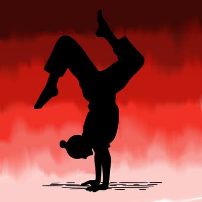 a woman doing a handstand
