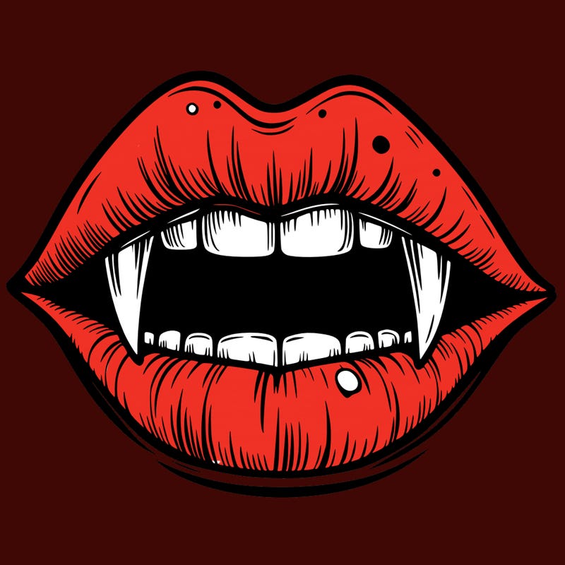 lips with vampire teeth
