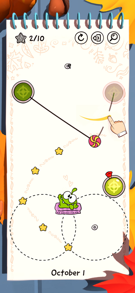 Cut the Rope Daily - Gameplay of a daily puzzle level in Cut the Rope Daily featuring Om Nom and autumn decorations