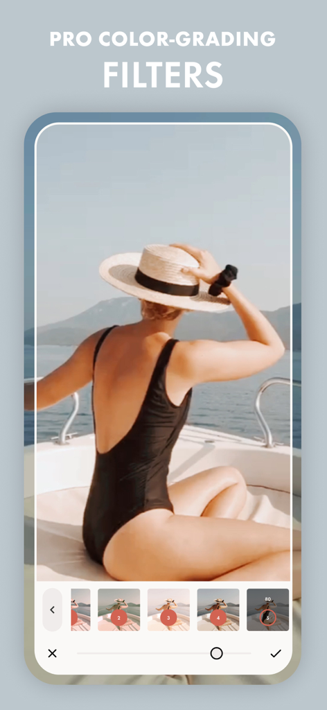 Filmm: One-Tap Video Editor - Interface do aplicativo Filmm mostrando filtros profissionais de gradação de cores aplicados a um vídeo de estilo de vida de uma mulher em um barco.