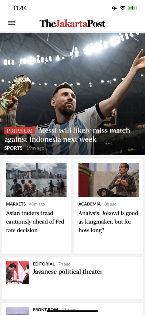 Interfaccia dell'app The Jakarta Post con titoli di notizie su sport e mercati