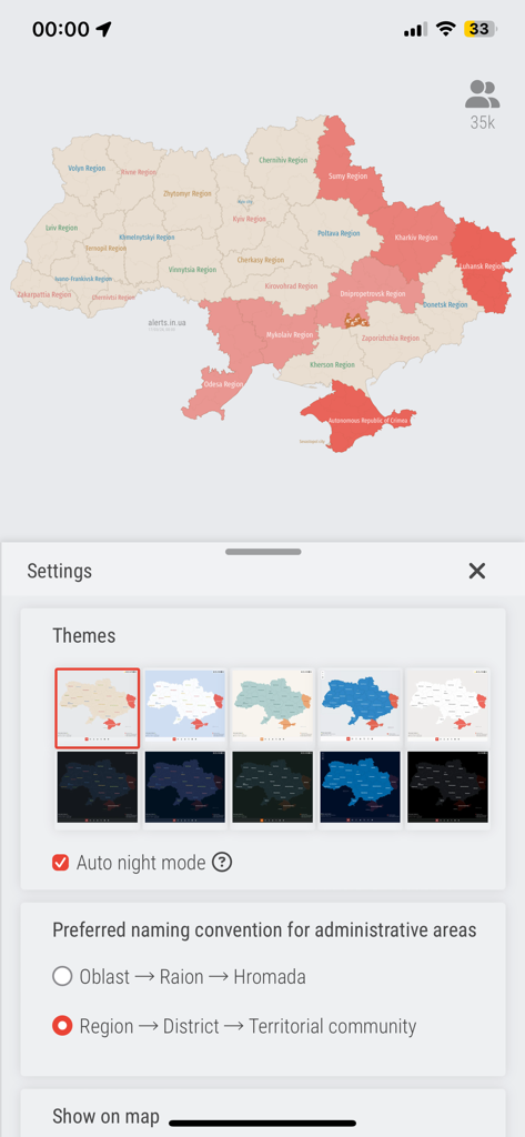 Settings screen of the Air Raid Alert Map of Ukraine app showing theme selection and administrative naming options