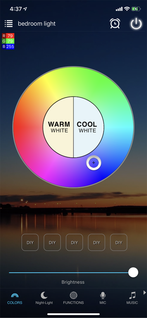 Magic Home Pro app showing a color wheel and brightness slider for bedroom light control