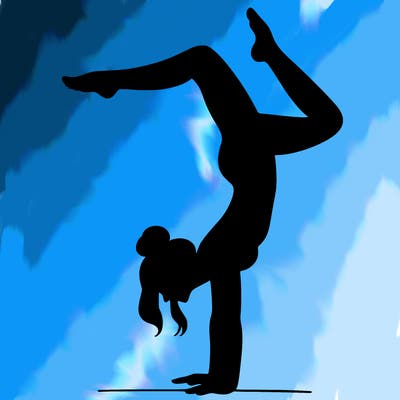 a woman doing a handstand