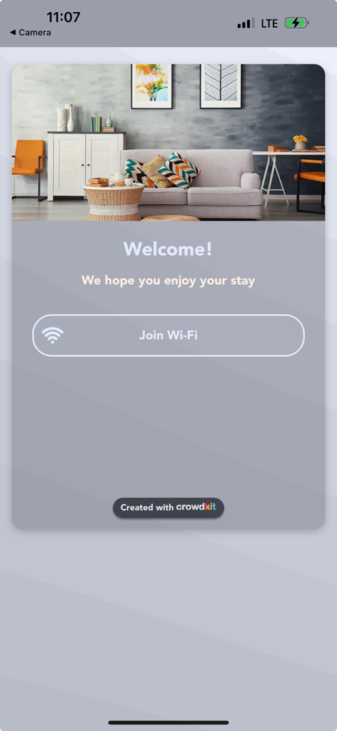 Pantalla de bienvenida de la aplicación Guest Wi-Fi for Wifi Porter con un botón Join Wi-Fi y una imagen de una sala de estar