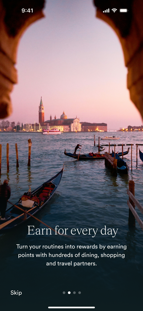 Atmos Rewards app screen featuring a sunset view of Venice gondolas with text about earning points for travel