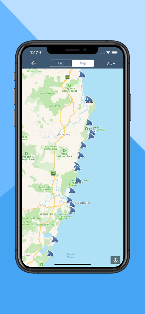 Map view of the Dorsal Shark Reports app showing multiple shark sighting icons along a coastline