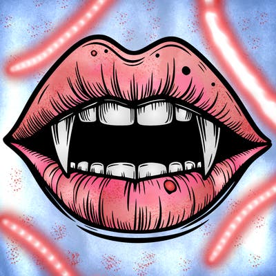 lips with vampire teeth