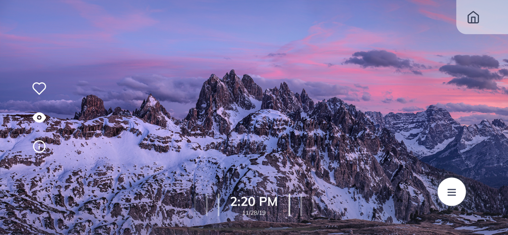 Roundshot Livecam - High resolution panoramic view of snowy mountain peaks under a purple sunset sky in the Roundshot Livecam app.