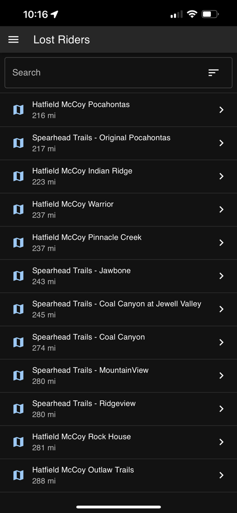 Lost Riders - List of nearby off-roading trail systems including Hatfield McCoy and Spearhead Trails within the Lost Riders app interface.