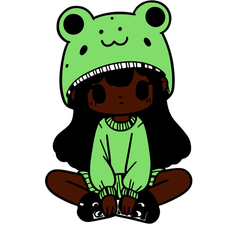 a girl wearing a frog hat and some frog socks