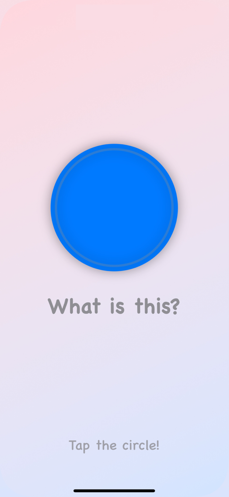 Toddler learning color recognition with a blue circle on a screen asking what is this