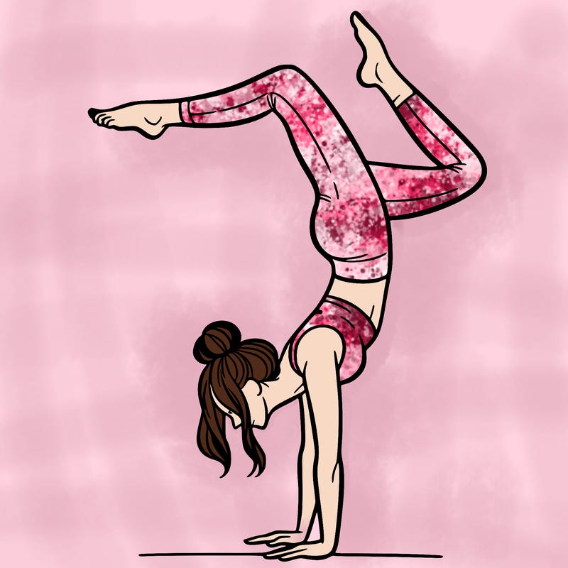 a woman doing a handstand