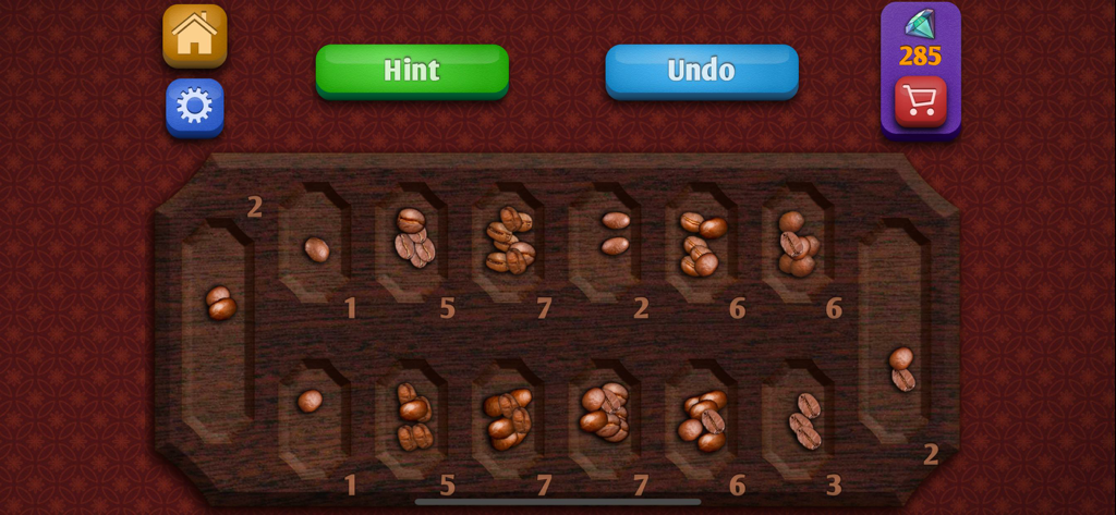 Interfaz de juego de mesa digital de Mancala con granos de café como piezas y botones de interfaz para pista y deshacer.