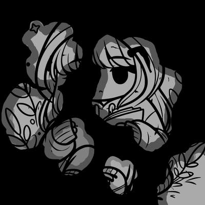 girl in oversized hoodie reading a book