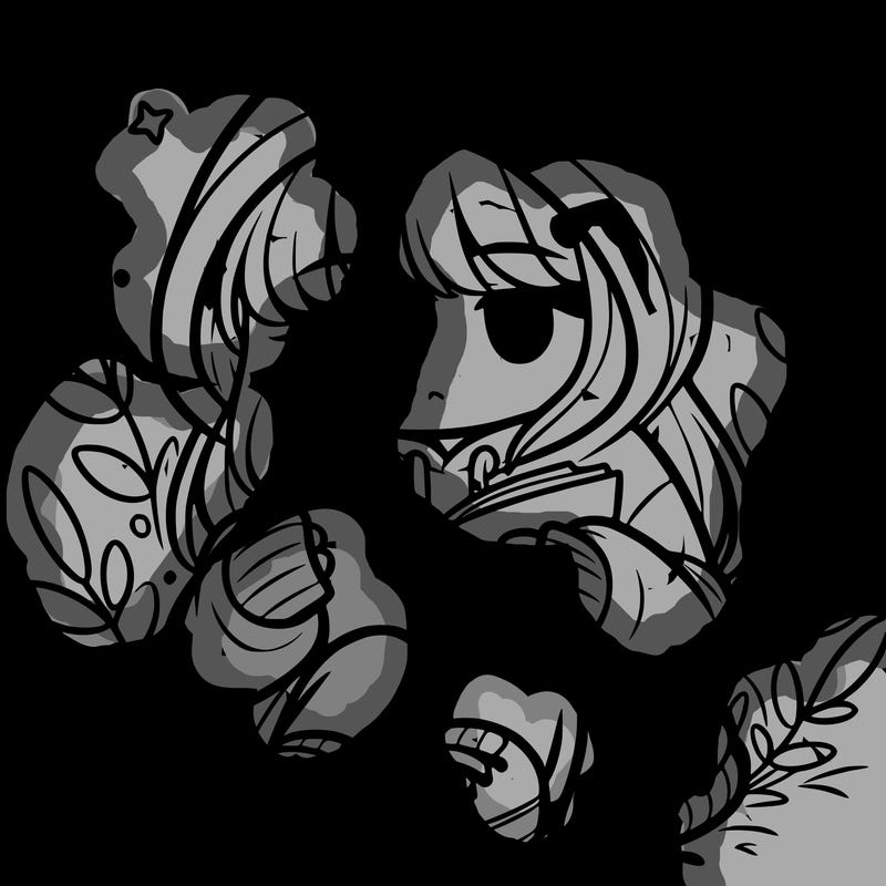 girl in oversized hoodie reading a book