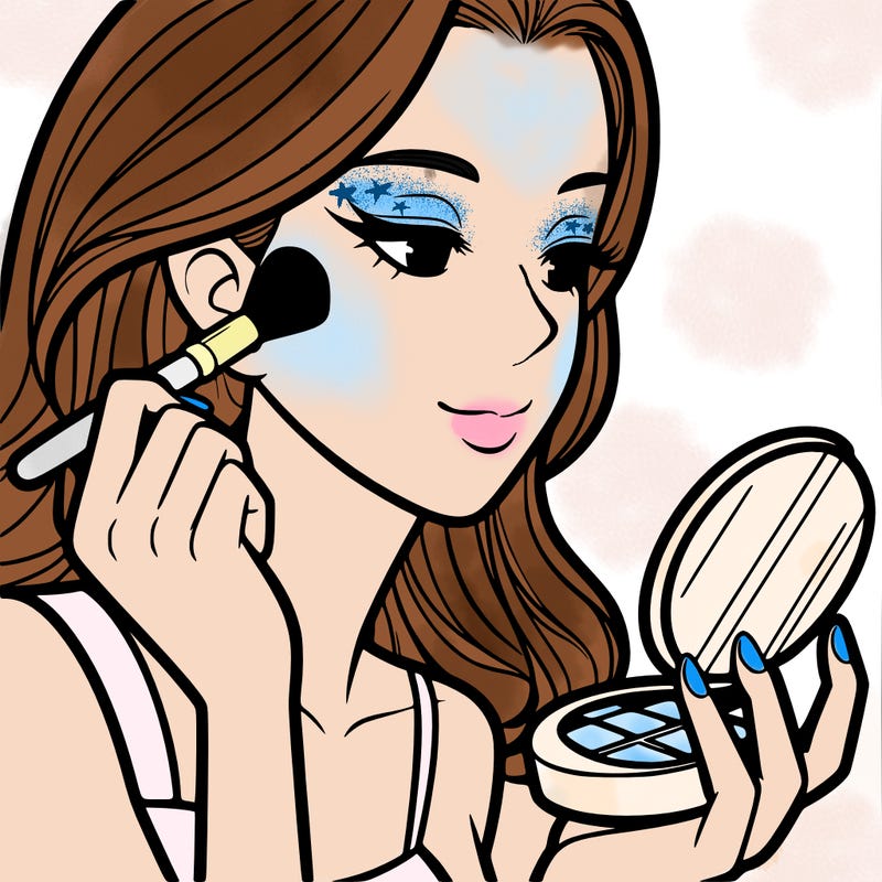 little girl putting on makeup