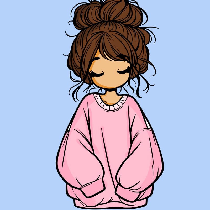 girl with baggy sweatshirt and messy bun