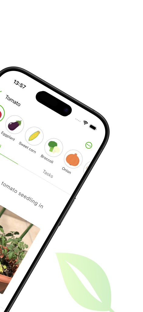 Garden Diary - Home Gardening - Garden Diary app interface showing vegetable icons for eggplant, sweet corn, and broccoli with a tomato plant photo entry.