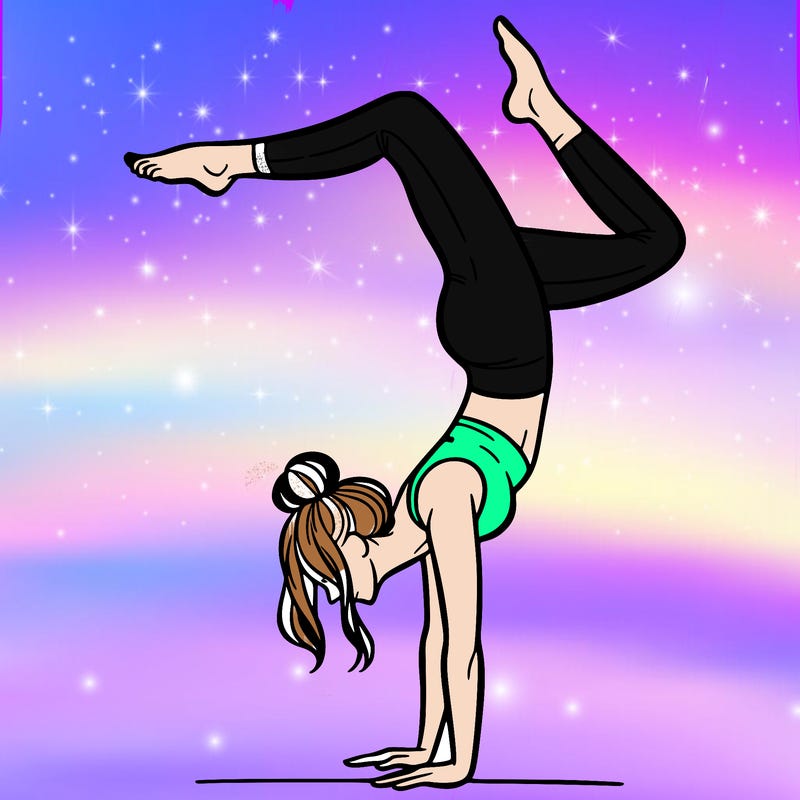 a woman doing a handstand