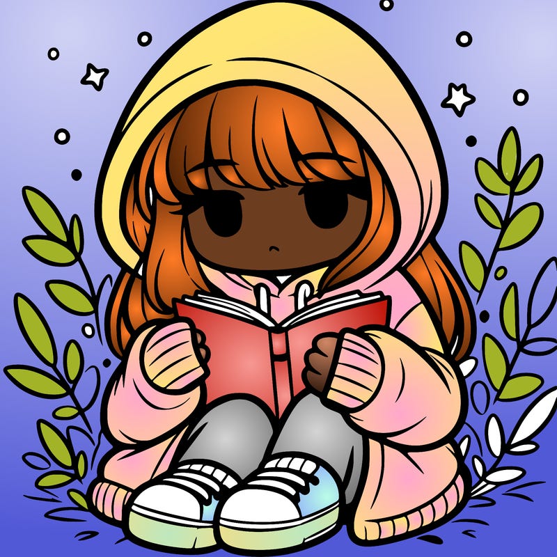 girl in oversized hoodie reading a book