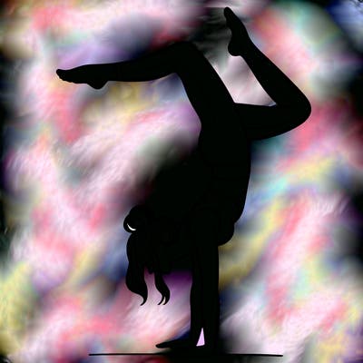 a woman doing a handstand