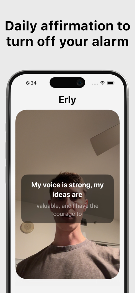 A young man completing a daily affirmation mission in the Erly app to turn off his morning alarm.