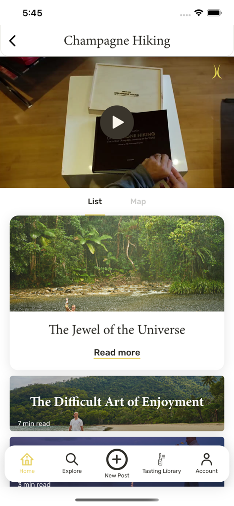 La aplicación Champagne Club muestra la sección Champagne Hiking con artículos de estilo de vida y un video sobre libros de champán.