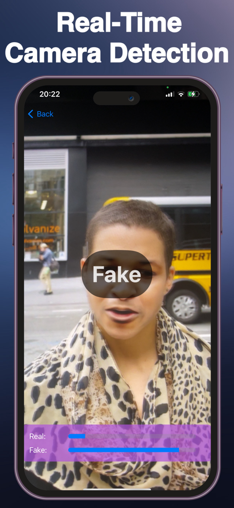 Smartphone screen displaying real-time deepfake detection on a person face with a fake label overlay