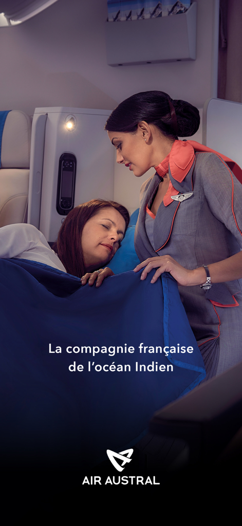 Air Austral flight attendant assisting a passenger in a luxury cabin