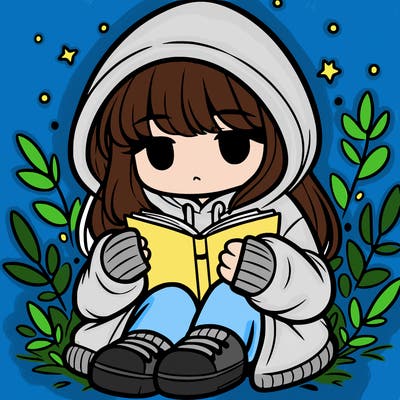 girl in oversized hoodie reading a book