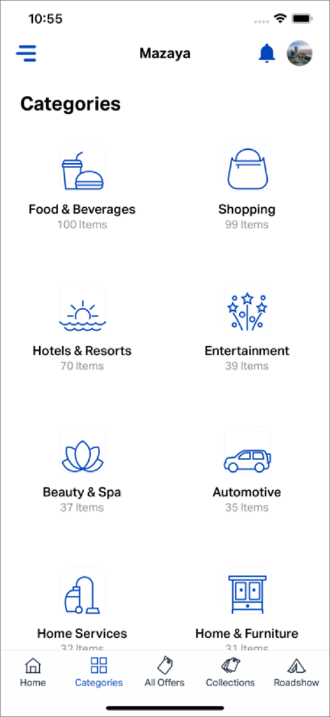 A mobile screen showing various lifestyle discount categories like dining shopping hotels and wellness in the Mazaya Offers app