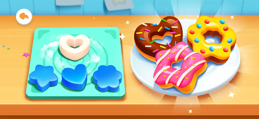 Panda Bake Cake Shop - 皿の上にハート、星、花の形をしたデコレーションされたドーナツと、生地カッターが並べられた3Dデジタルシーン