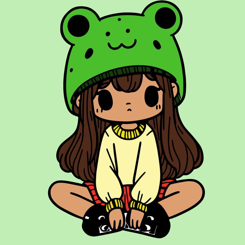 a girl wearing a frog hat and some frog socks