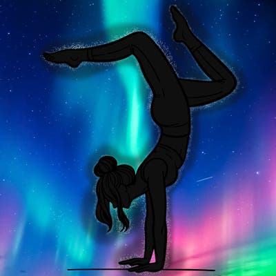 a woman doing a handstand