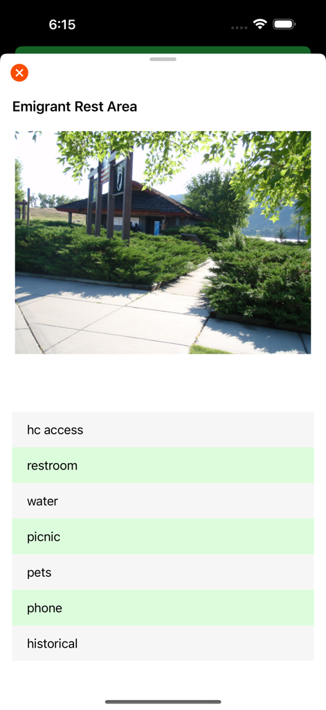 Montana Traveler app screen displaying services and photo for the Emigrant Rest Area